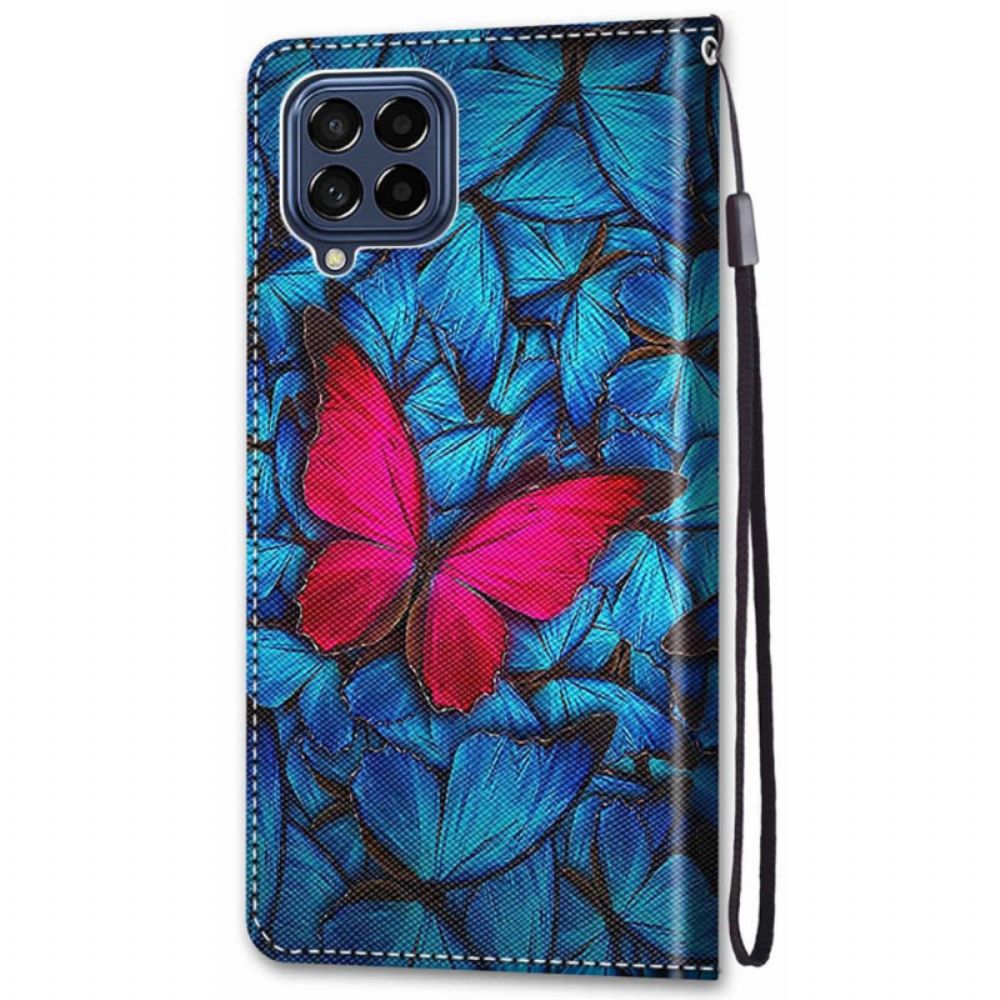 Lederhüllen Für Samsung Galaxy M53 5G Roter Schmetterling Auf Blauem Hintergrund